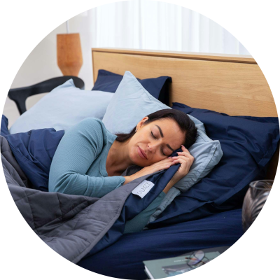 A woman peacefully asleep in bed